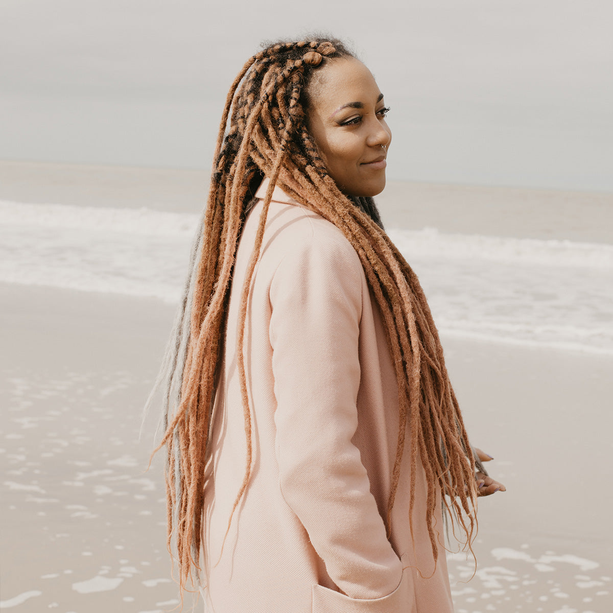 Gin with Rusty pink dreadlock extensions, Blog Washing dreadlock extensions, Dread care, Dollylocks, Raw roots