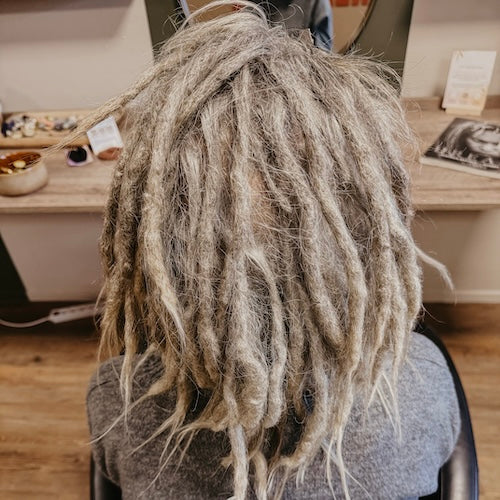 When do Real dreads grow into each other and can Synthetic dreadlocks also do that?