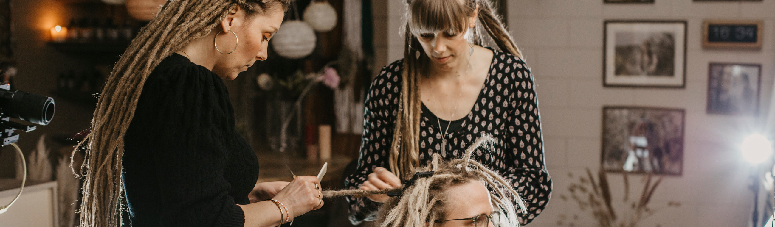 Renate and Diane working on Real dreadlocks, filming it for the online course