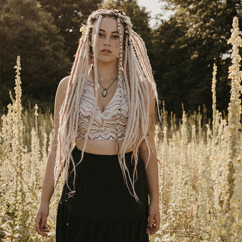 Model wearing high quality dreadlocks from Dreadshop, Locks of Love, Ash Blonde/ Rusty Pink color