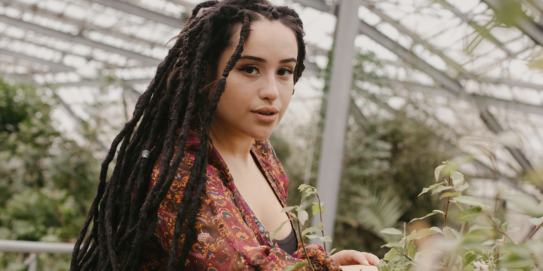 Romy wearing a set of Midnight Original locks of love