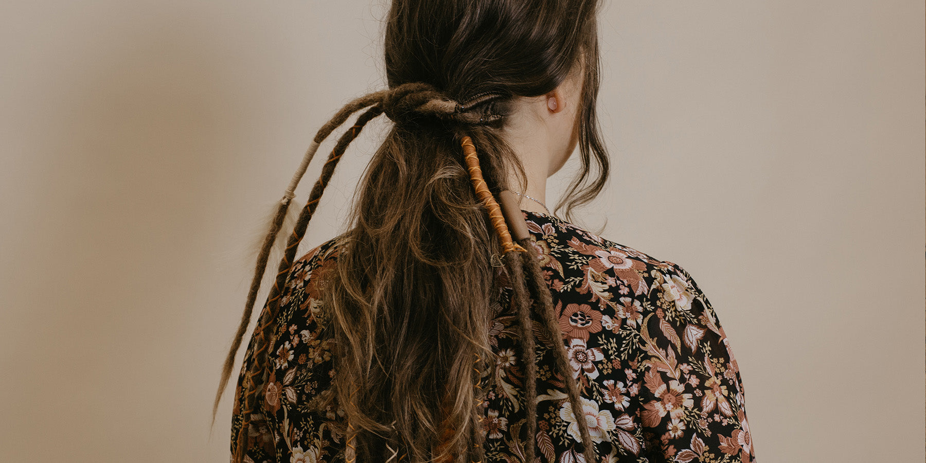 Partial dreads. model wearing a brown accent set
