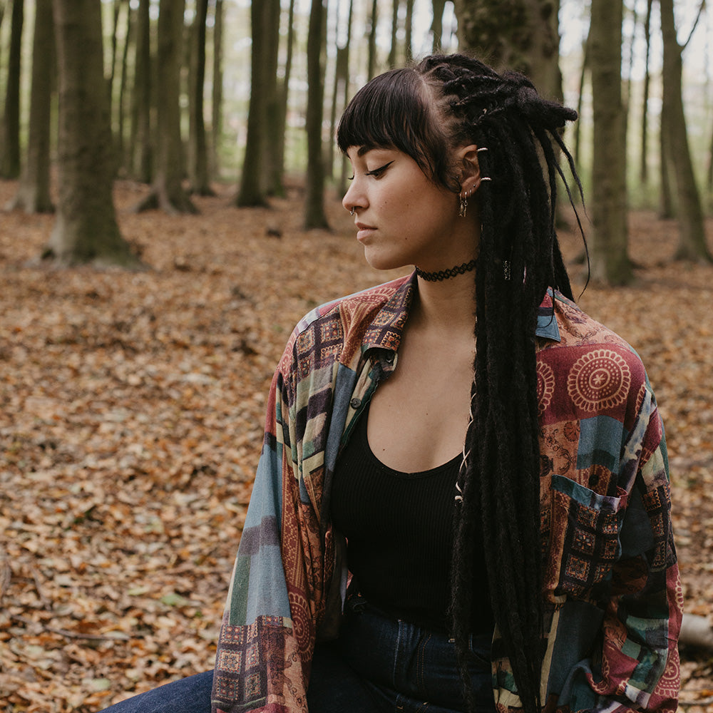Model wearing high quality dreadlocks from Dreadshop, midnight color