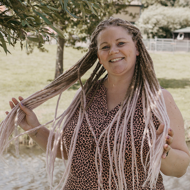 Model wearing high quality dreadlocks from Dreadshop, Locks of Love, Pearly D only available in the Salon