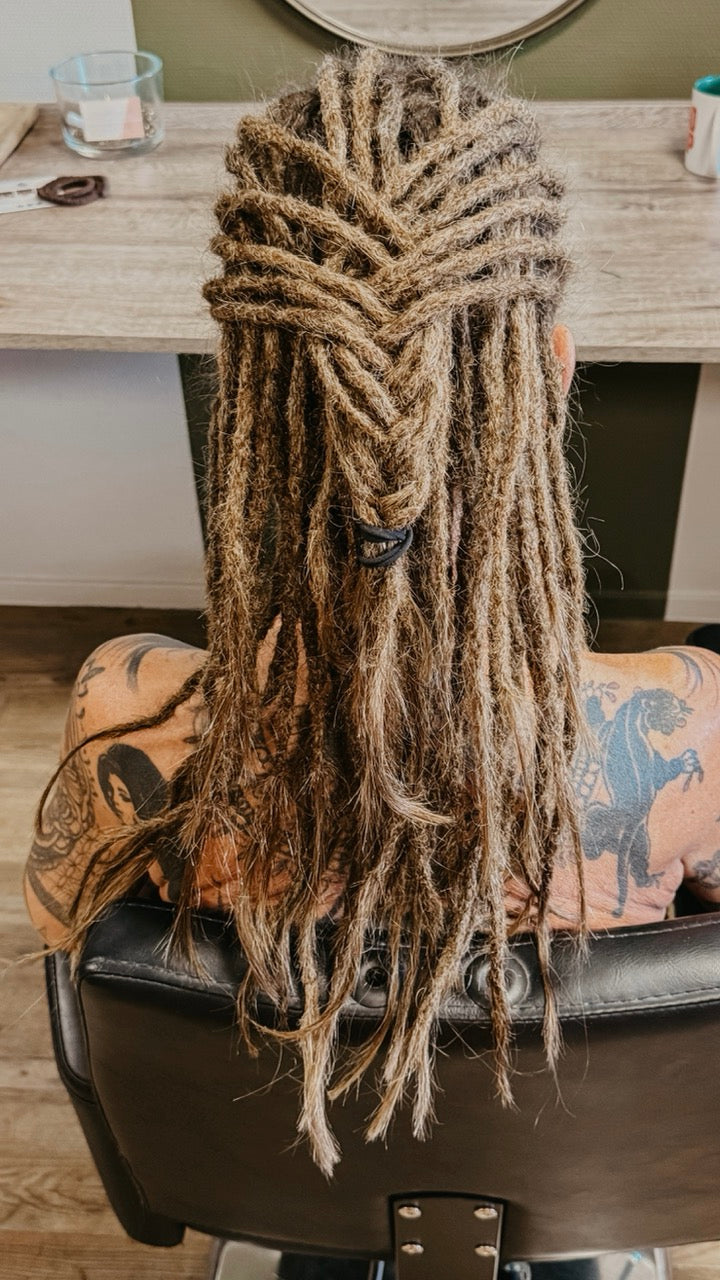 Back view of a client with real dreadlocks in the Dreadshop Salon