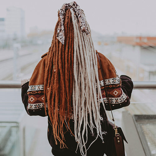 Emitsem from the back wearing the dreadset Split gingerash in Bum length, Dreadset Locks of Love Shop the look, dreadset full head, Dreadset original locks of love