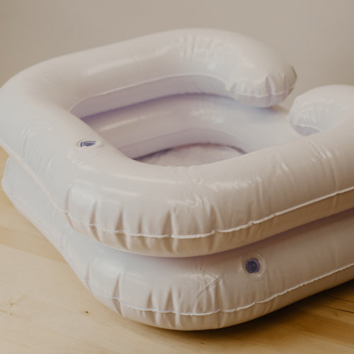 Inflatable shampoo basin