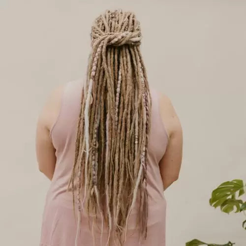 danielle with her dark blonde locks of love and accent set Plum for Partial dreads ash blonde with purple decoration