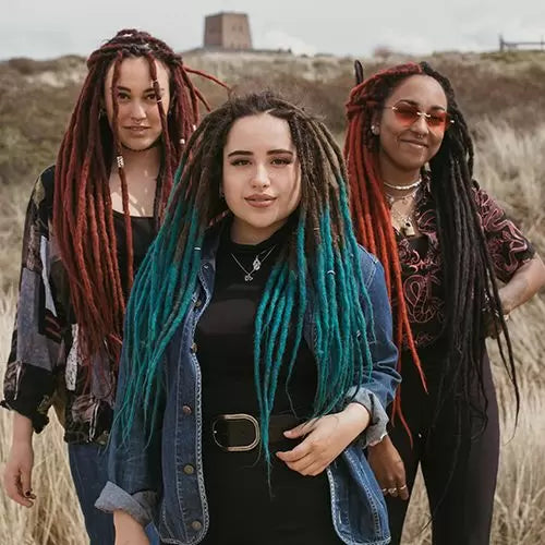 3 models standing in the grass with our locks of love, Full head, Shop the look, plain dreads, loose bundles