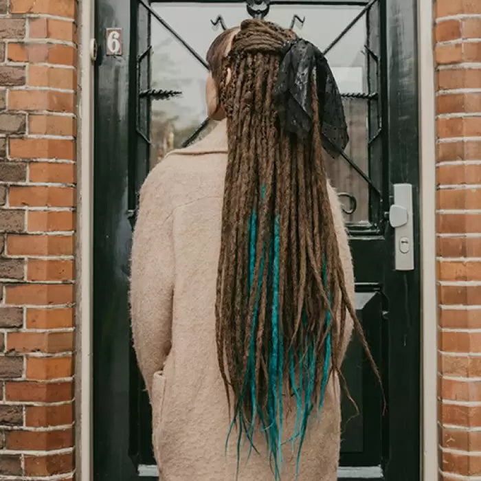 Emitsem wearing the dreadset natural ocean in Bum length, a mix of dark chocolate and wild ocean, Dreadset Locks of Love Shop the look, dreadset full head, Dreadset original locks of love