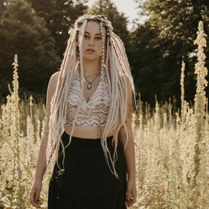 Romy wearing the dreadset Hidden rusty in Bum length, Dreadset Locks of Love Shop the look, dreadset full head, Dreadset original locks of love