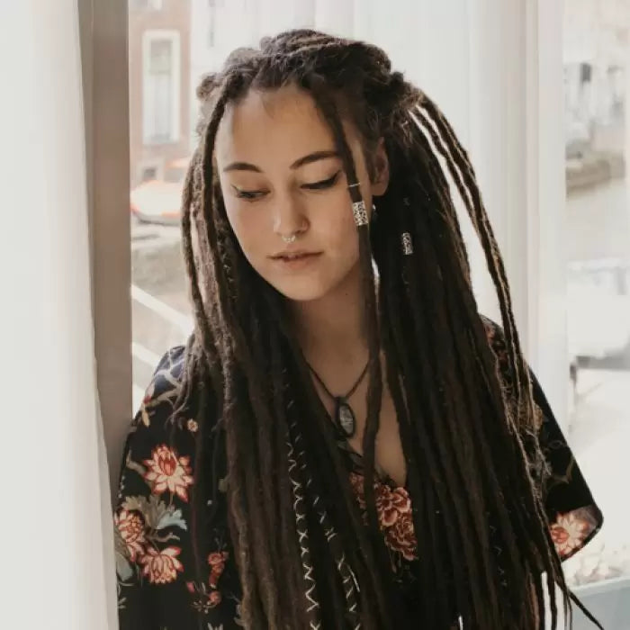 Romy wearing the dreadset Dark chocolate in Bum length, Dreadset Locks of Love Shop the look, dreadset full head, Dreadset original locks of love 