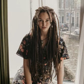 Romy wearing the dreadset Dark chocolate in Bum length, Dreadset Locks of Love Shop the look, dreadset full head, Dreadset original locks of love