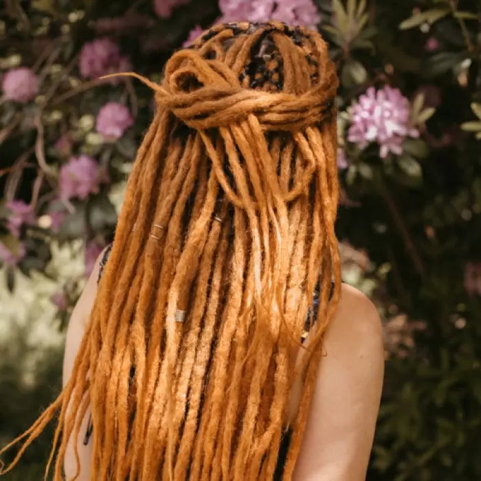 Back of Romy wearing the dreadset Go ginger in Bum length, Dreadset Locks of Love Shop the look, dreadset full head, Dreadset original locks of love