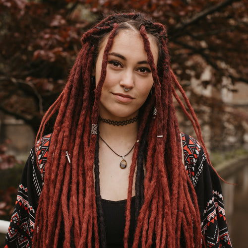 Romy wearing the dreadset Maroon in Bum length, Dreadset Locks of Love Shop the look, dreadset full head, Dreadset original locks of love