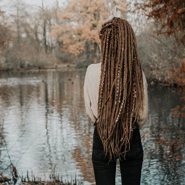 Emitsem from the back wearing the dreadset Hazelnut dream in Bum length, Dreadset Locks of Love Shop the look, dreadset full head, Dreadset original locks of love