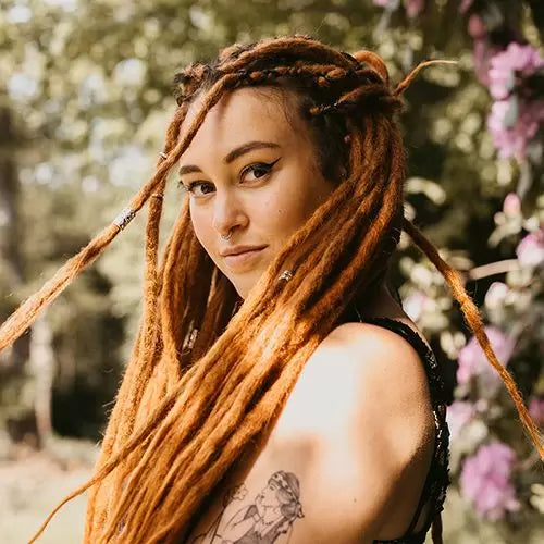 Decorated Dreadlocks with Silver beads set at Dreadshop
