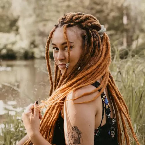 Decorated Dreadlocks with Silver beads set at Dreadshop