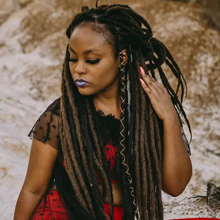 Mykel is wearing the dreadset Bittersweet Chocolate Bum length Locks of Love Shop the look, dreadset full head, Dreadset original locks of love