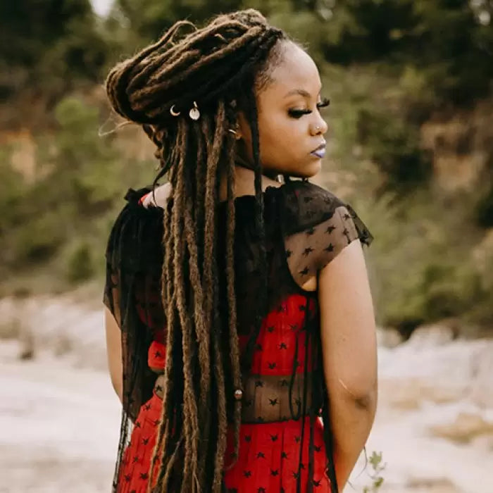 Mykel is wearing the dreadset Bittersweet Chocolate Bum length Locks of Love Shop the look, dreadset full head, Dreadset original locks of love