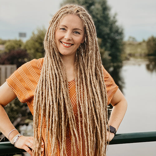 Renate wearing the dreadset Thin Dark blonde in Bum length, Dreadset Locks of Love Shop the look, dreadset full head, Dreadset thin locks of love
