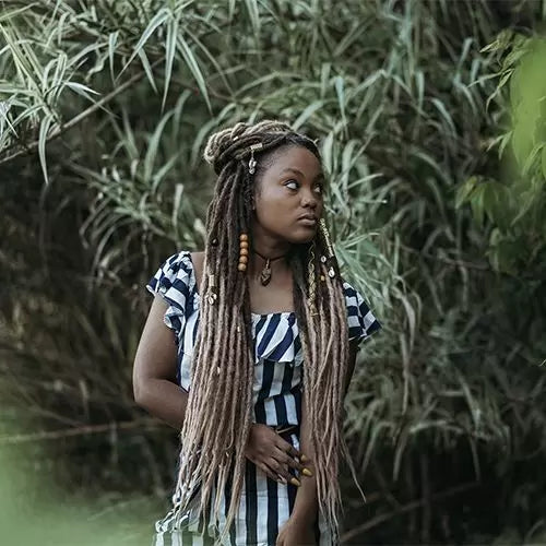 Mykel wearing the dreadset Caramel twist bum length Dreadset Locks of Love Shop the look, dreadset full head