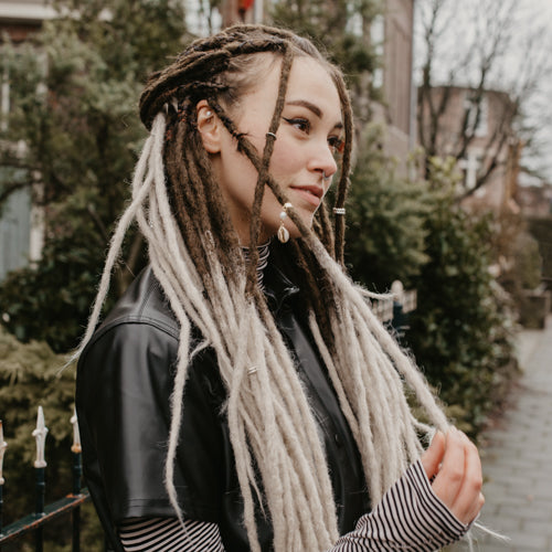 Decorated dreadlocks with Shell beads. set at Dreadshop