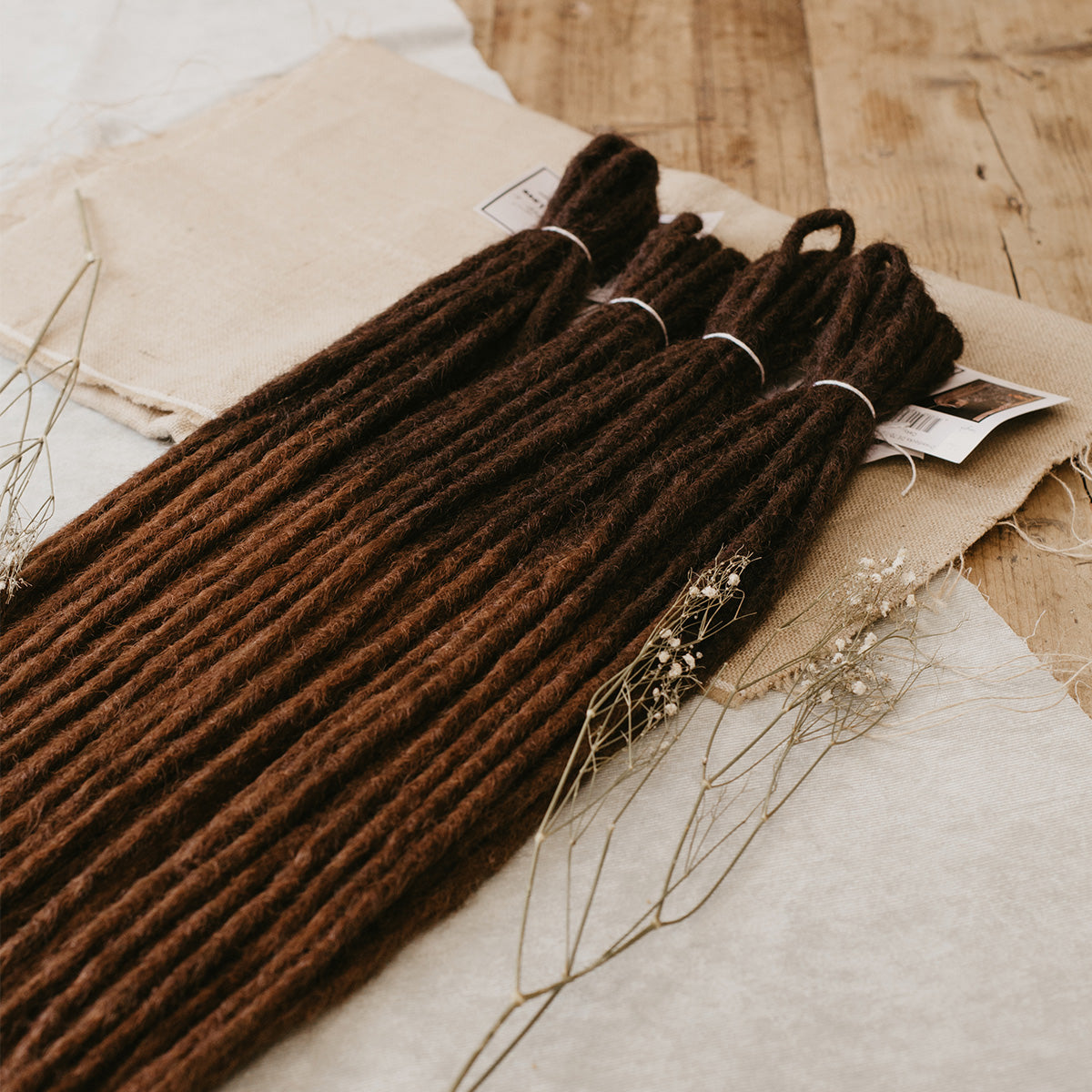 What is the best way to wash my Synthetic Dreads after I removed