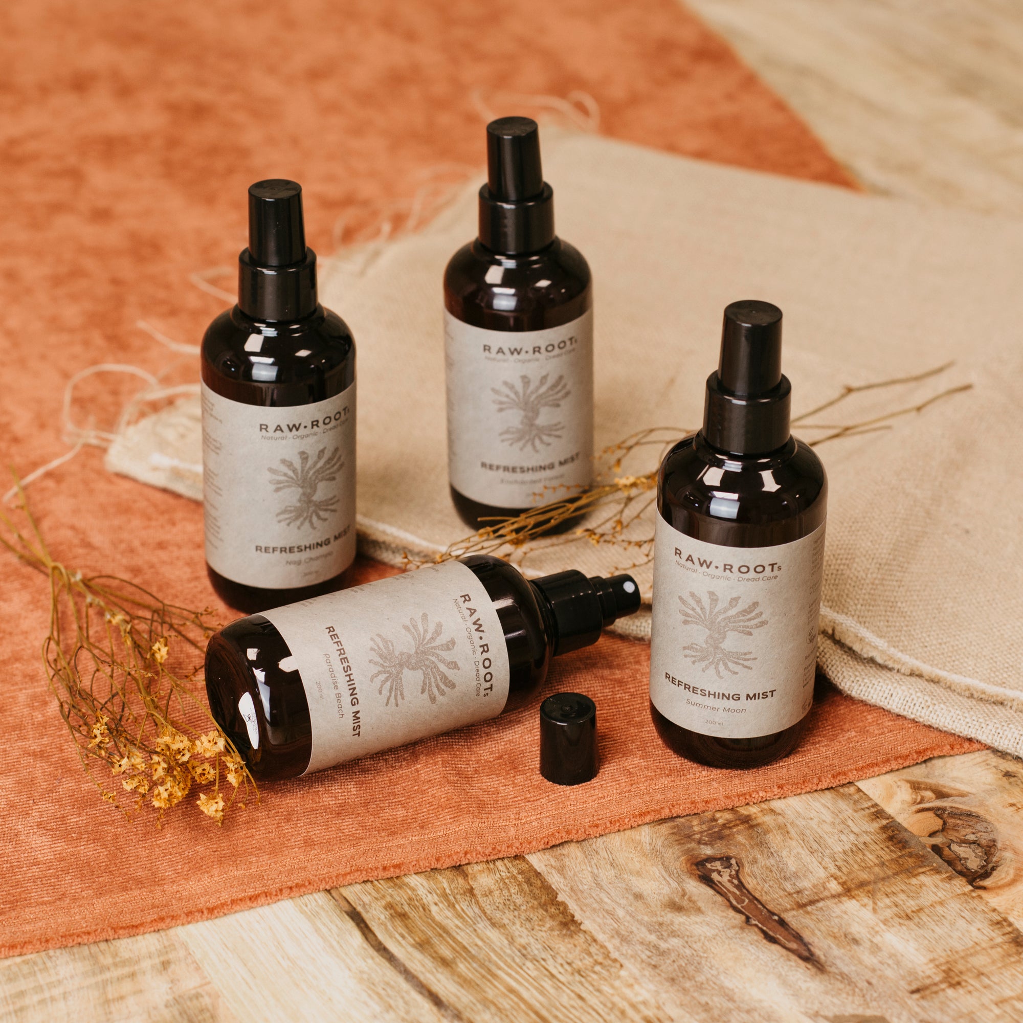 What is the difference between the Rescue Tonic and the Refreshing Mist from RAW ROOTs?