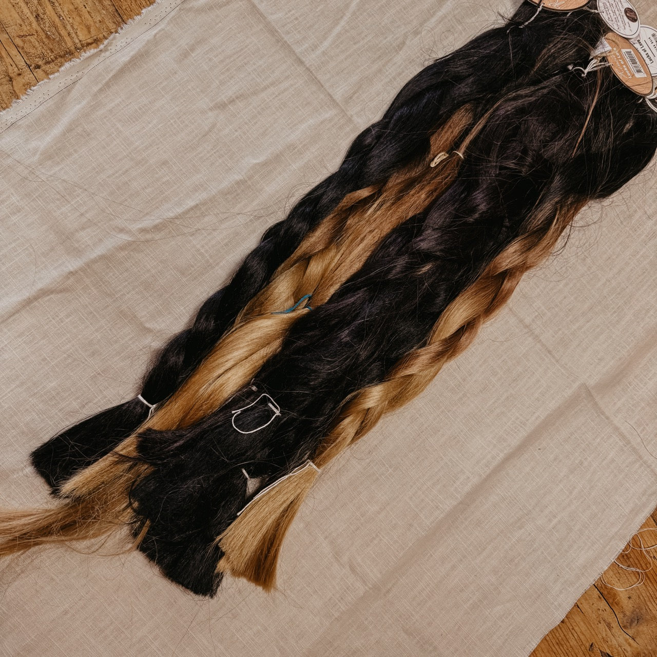 Black Synthetic Hair Braids in Bulk. Henlon Hair braids from Dreadshop warehouse, tangled and fluffy. 