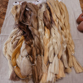 Blonde Synthetic Hair Braids in Bulk. Henlon Hair braids from Dreadshop warehouse, tangled and fluffy. 