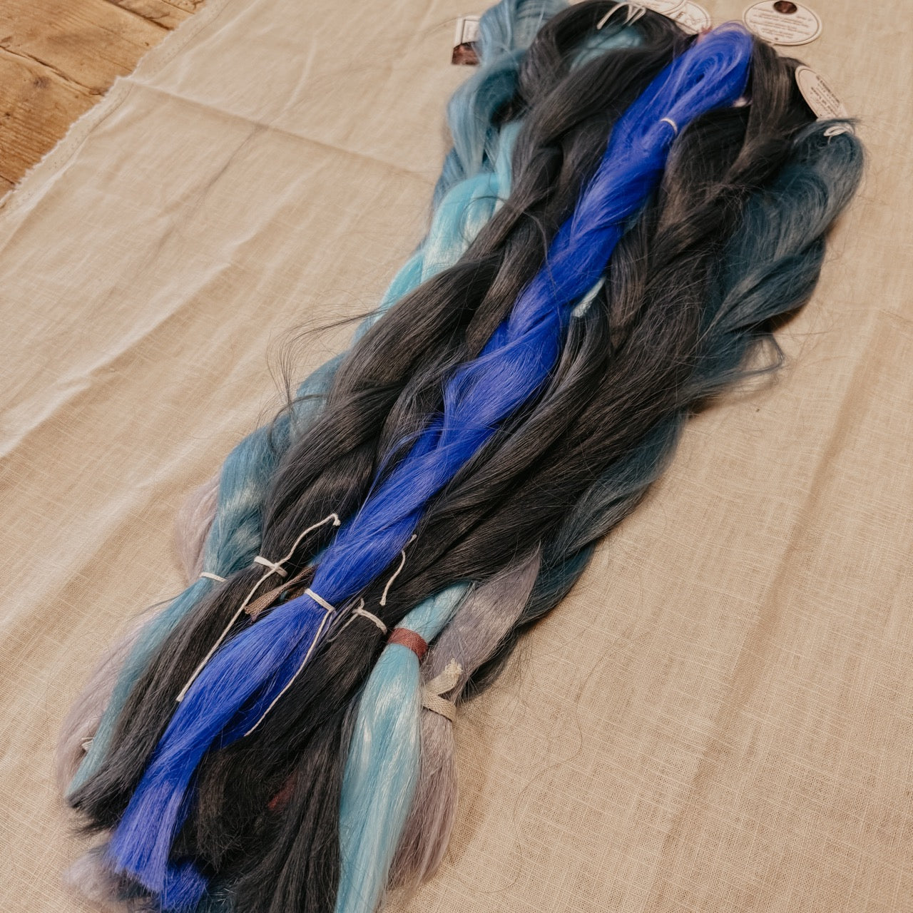 Blue Synthetic Hair Braids in Bulk. Henlon Hair braids from Dreadshop warehouse, tangled and fluffy. 