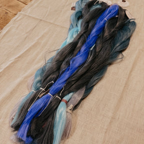 Blue Synthetic Hair Braids in Bulk. Henlon Hair braids from Dreadshop warehouse, tangled and fluffy. 