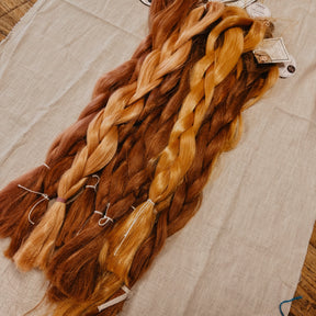 Ginger Synthetic Hair Braids in Bulk. Henlon Hair braids from Dreadshop warehouse, tangled and fluffy. 