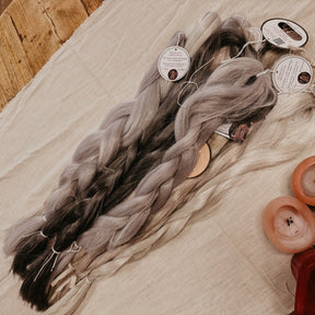 Gray tones Synthetic Hair Braids in Bulk. Henlon Hair braids from Dreadshop warehouse, tangled and fluffy. 