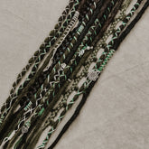Decorated Dreadlock Extensions: black and green mix, ombre dreads with decorations. Accent Set from Dreadshop. 