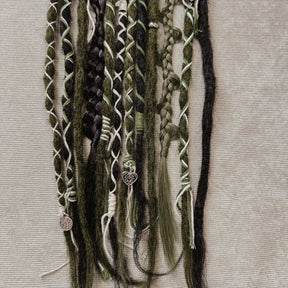 Decorated Dreadlock Extensions: black and mossy mix, ombre dreads with decorations. Accent Set from Dreadshop. Close up on the ends