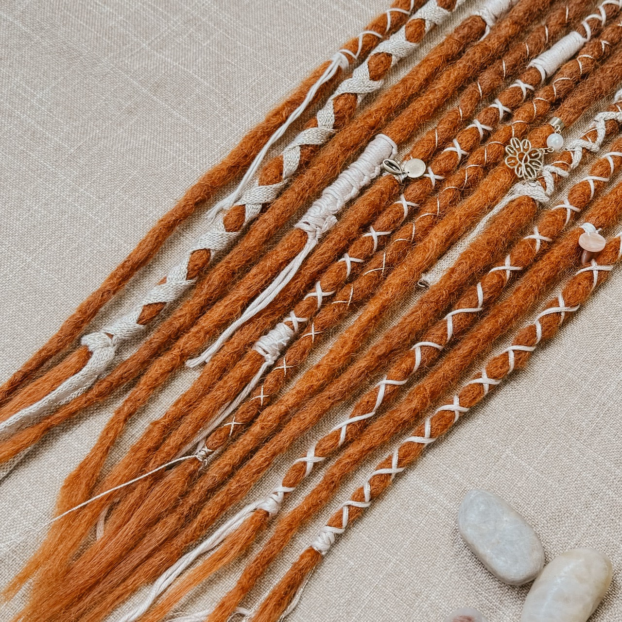 Decorated Dreadlock Extensions: ginger ombre dreads with decorations. Accent Set from Dreadshop. Close up on the ends