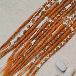 Decorated Dreadlock Extensions: ginger ombre dreads with decorations. Accent Set from Dreadshop. Close up on the ends
