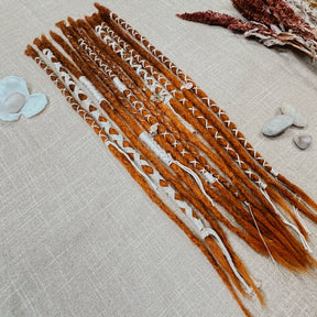 Decorated Dreadlock Extensions: ginger ombre dreads with decorations. Accent Set from Dreadshop. 