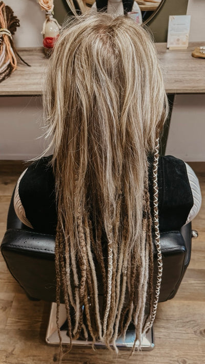 Partially braided dreadlock extensions. Dreadshop Salon customer. Short hair with longer dreadlocks