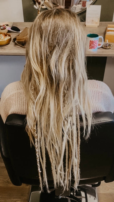 Partially braided dreadlock extensions. Dreadshop Salon customer. Short hair with longer dreadlocks, decorated dreadlock set