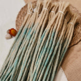 Dreadlock Extensions: ombre color, blonde and blue loose bundles.SaltyDreads Sample from Dreadshop. 