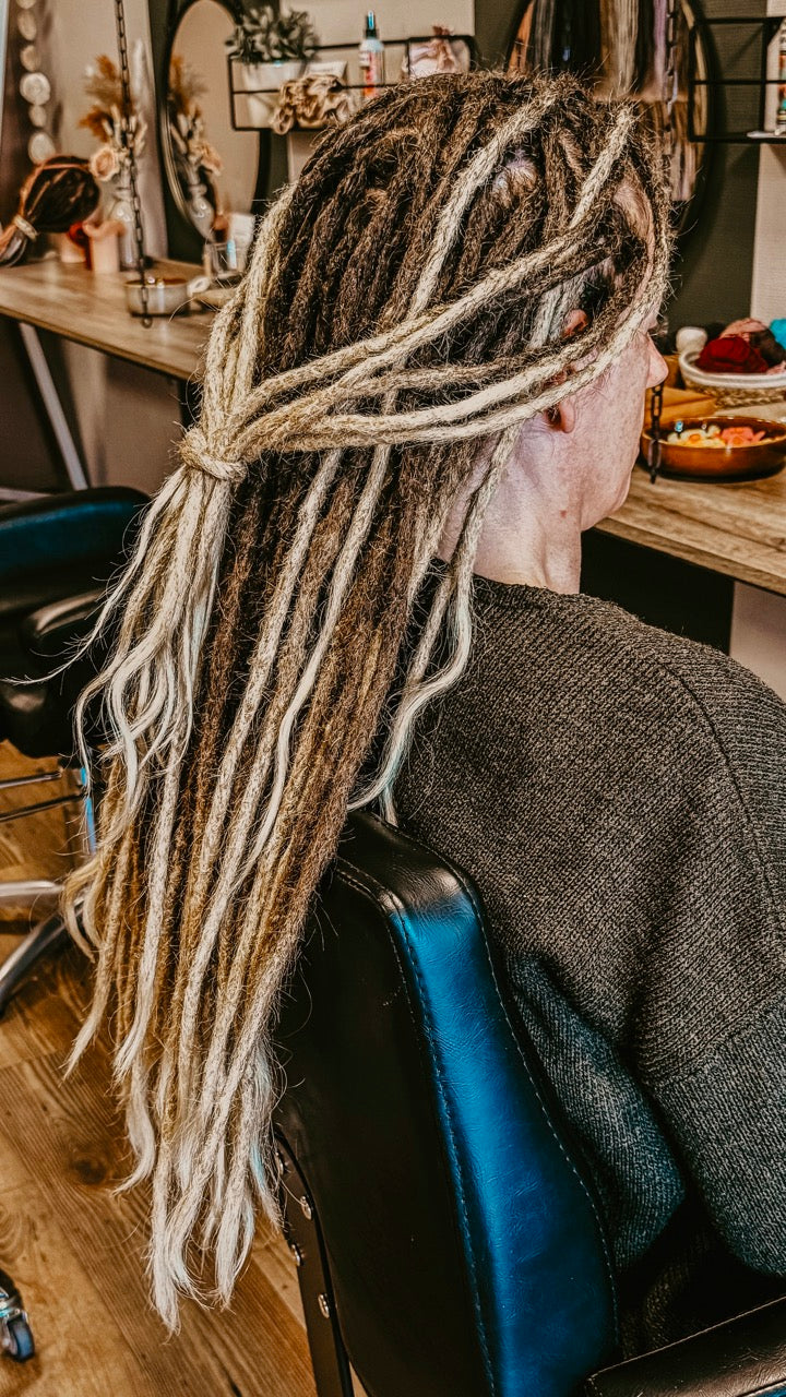 Side photo of Dreadshop Salon Client with Real Dreadlocks, full head 